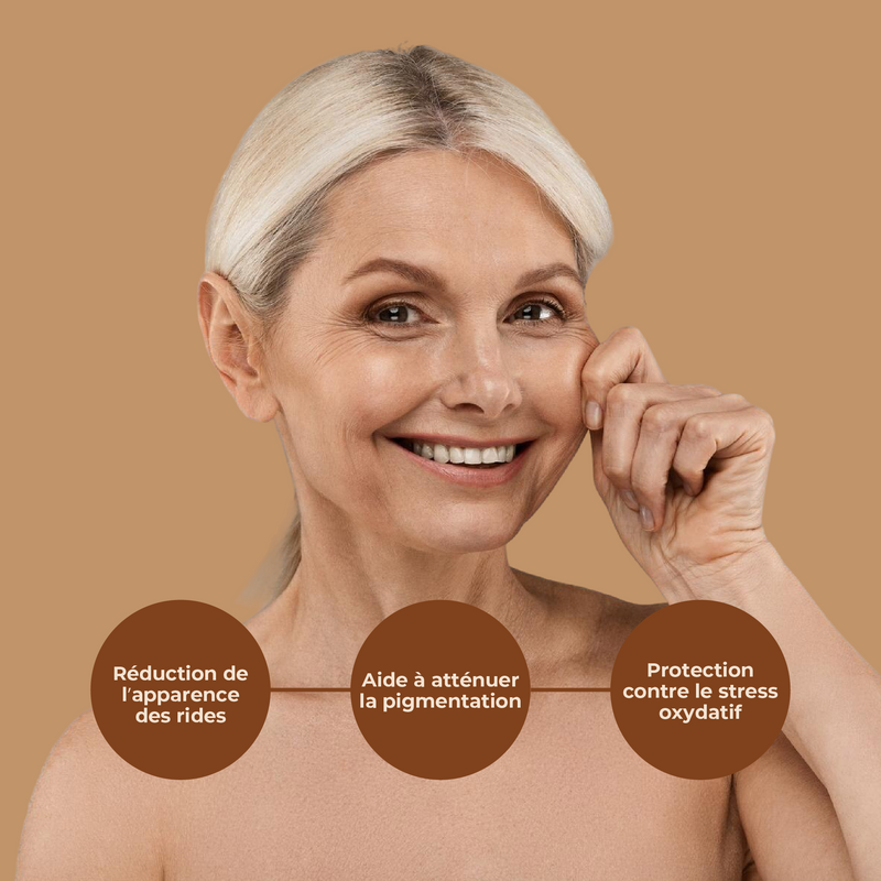 Woman with a tan background showing skin care benefits