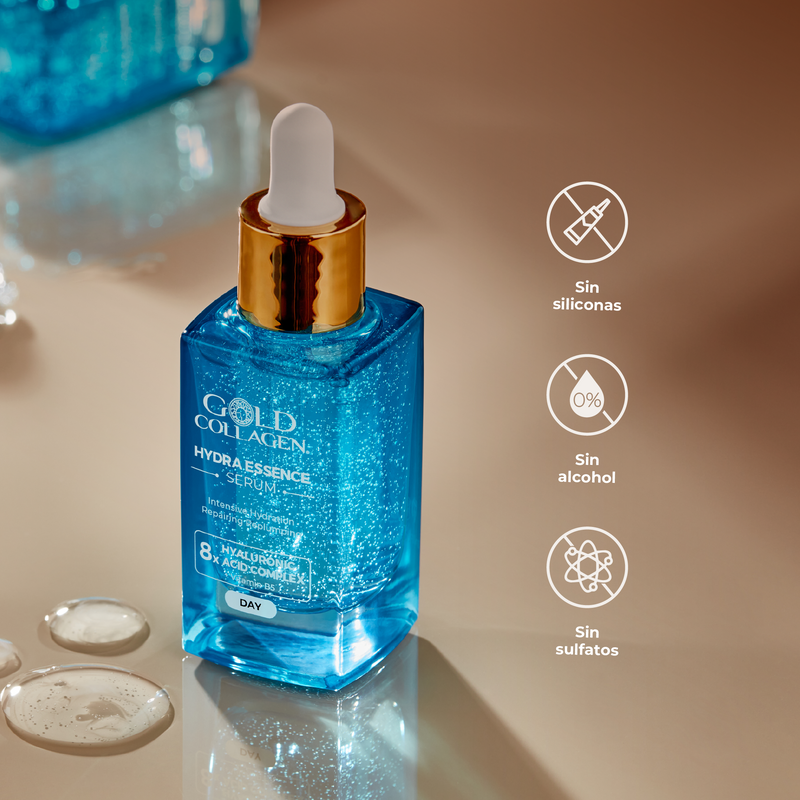 Blue serum bottle with dropper on a beige surface, featuring Gold Collagen branding.