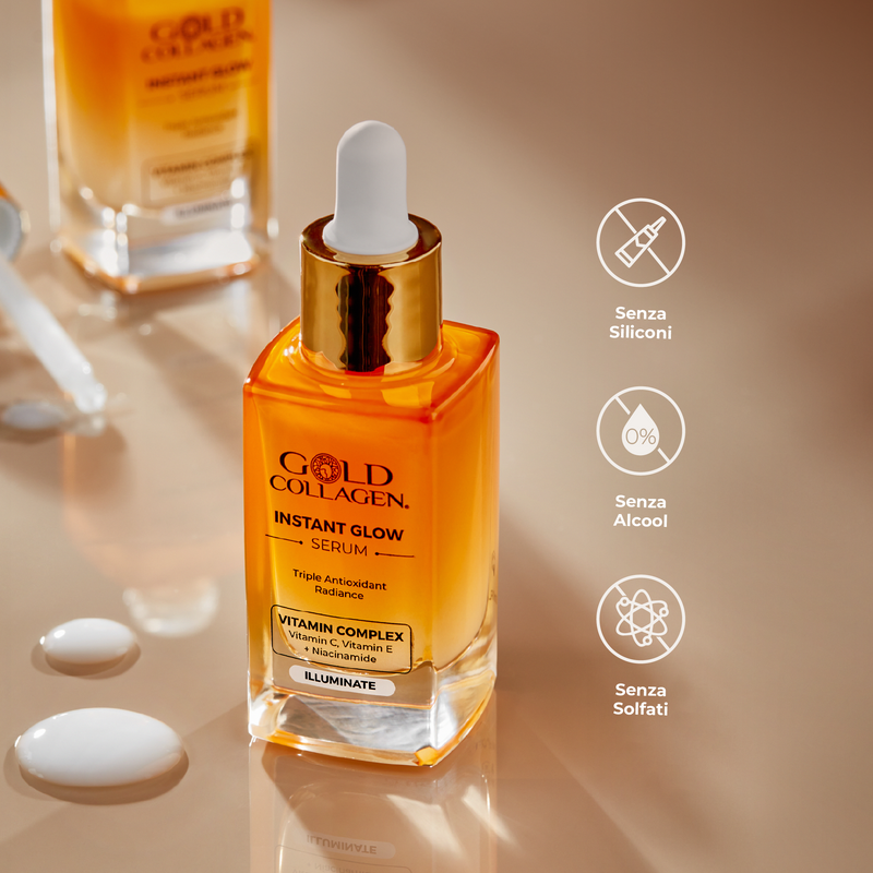 Gold Collagen Instant Glow Serum bottle with dropper on a beige background